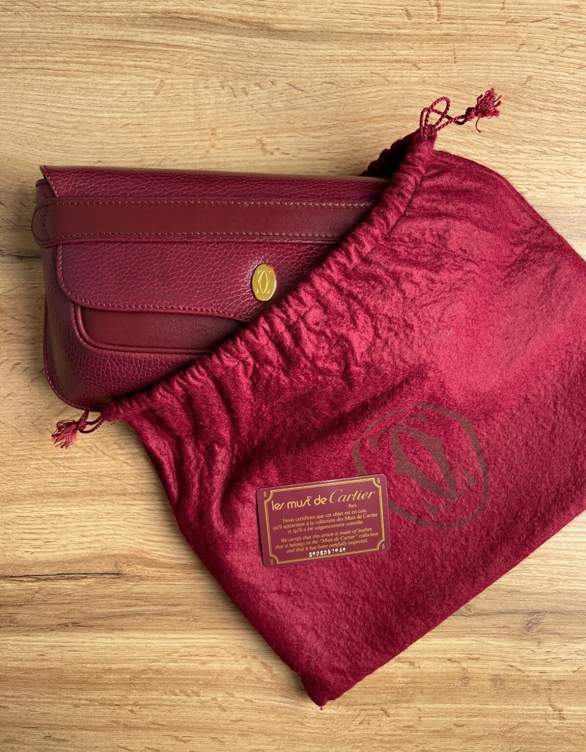 Must de Cartier leather clutch